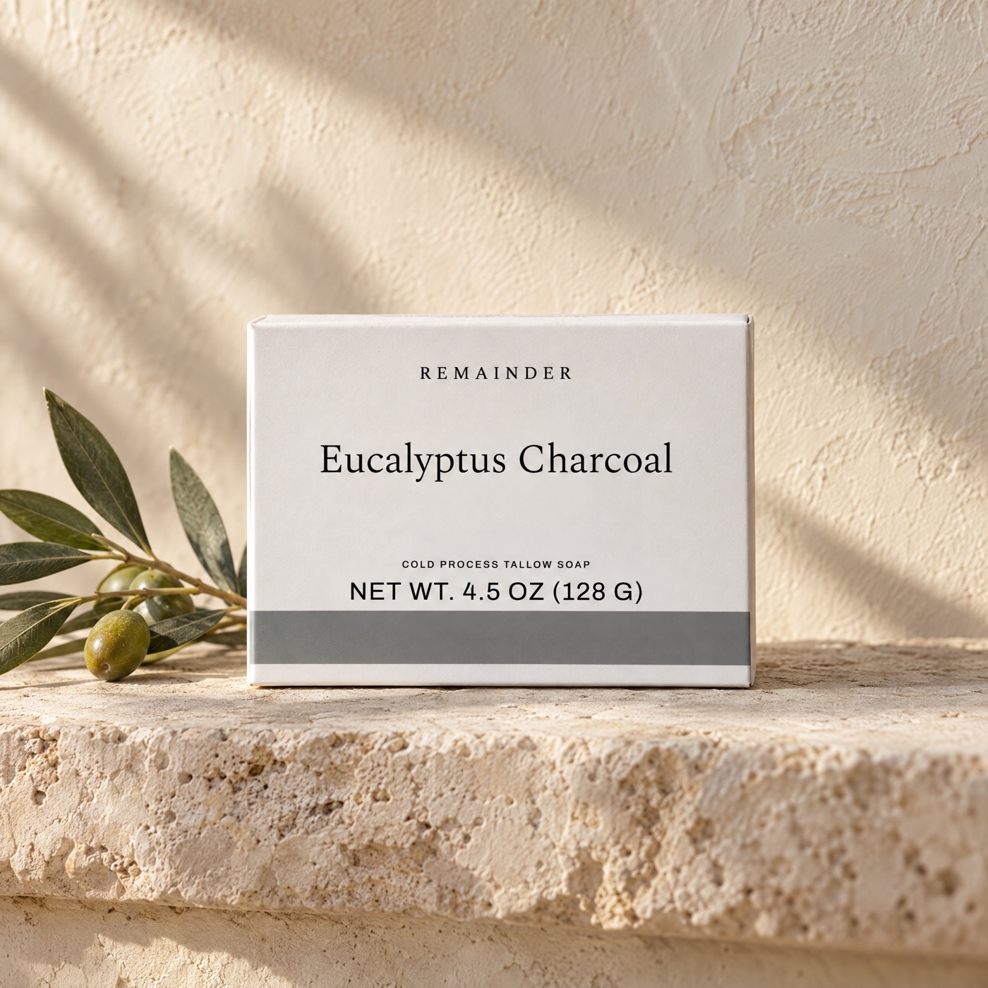 Eucalyptus Charcoal box on limestone against limewash plaster