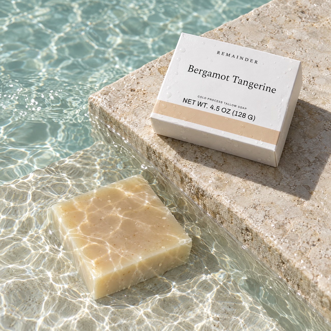 Bergamot Tangerine box on a limestone step, bar under shallow water